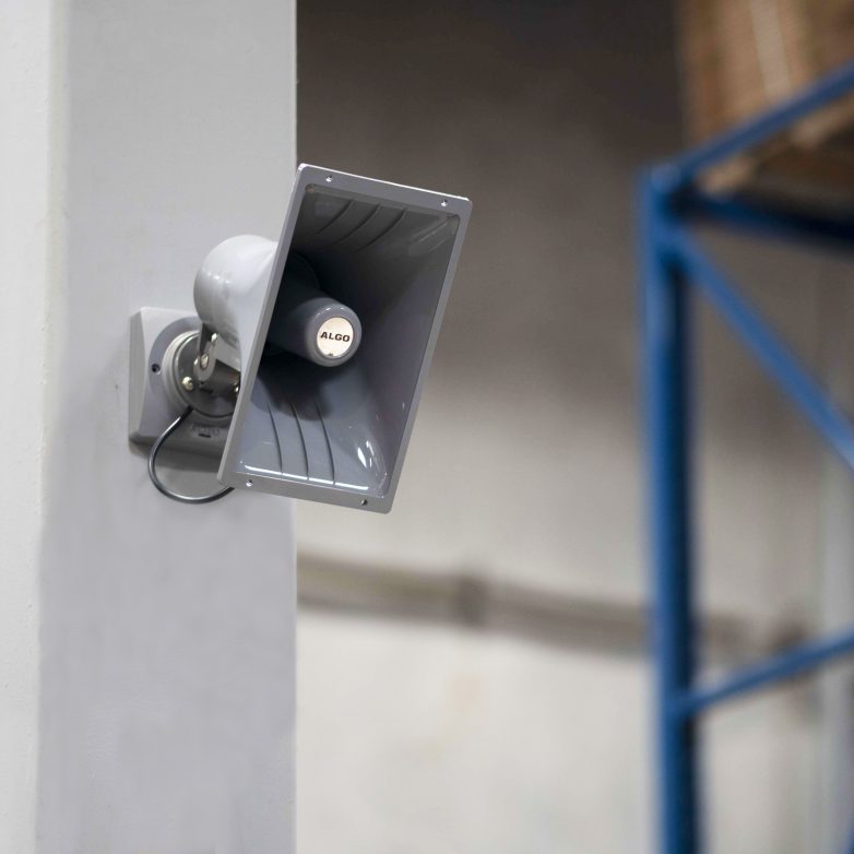 Algo Horn Speaker on Pole in Warehouse