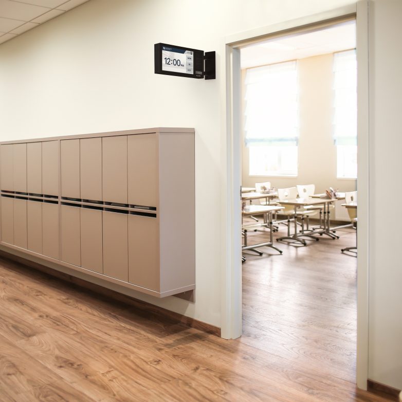 8420 on wall outside classroom - in situ image